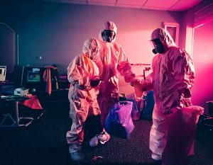 Firefly A professional crime scene cleanup team in full protective gear PPE using advanced cleanin 13