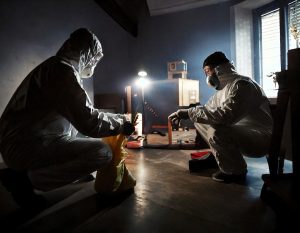 Firefly A professional crime scene cleanup team in full protective gear PPE using advanced cleanin 19